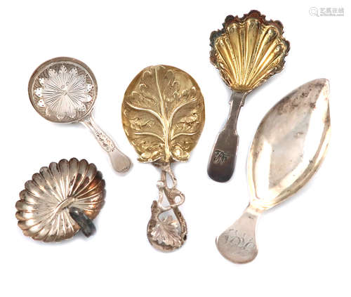 A collection of five antique silver caddy spoons, various dates and makers, including: a George