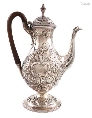 A George III silver coffee pot, main marks lost in decoration, the cover with maker's mark of I.W,