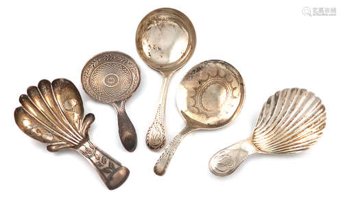 A collection of five antique silver caddy spoons, various dates and makers, including: a George