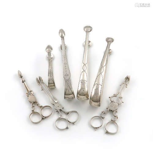 A mixed collection of silver sugar tongs and nips, including an Irish provincial pair, by John