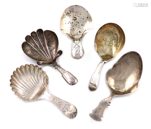 A collection of five antique silver caddy spoons, various dates and makers, including: a George