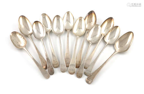 A collection of twelve silver Old English pattern tablespoons, various dates and makers, including