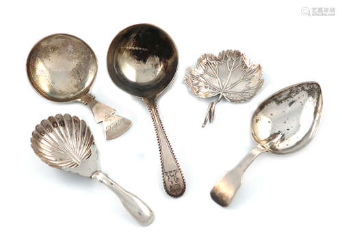 A collection of five antique silver caddy spoons, various dates and makers, including: a George