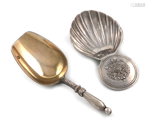 A Russian silver caddy spoon, 1896-1908, shovel form, gilded bowl, the reverse with initials, the