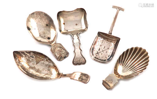 A collection of five antique silver caddy spoons, various dates and makers, including: a George