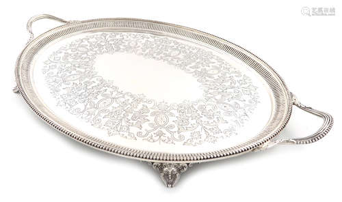 A Victorian silver two-handled tray, by Charles Boyton, London 1886, oval form, beaded and fluted