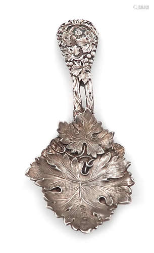 A George IV cast silver caddy spoon, by Reily and Storer, London 1828, leaf shaped bowl, the