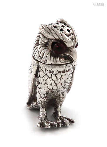 A modern novelty silver owl pepper, maker's mark of E and J, London 2001, modelled in a standing