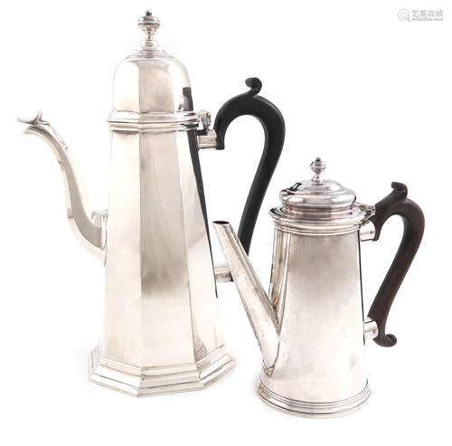 A silver coffee pot, by Thomas Bradbury and Son, London 1924, tapering octagonal form, scroll