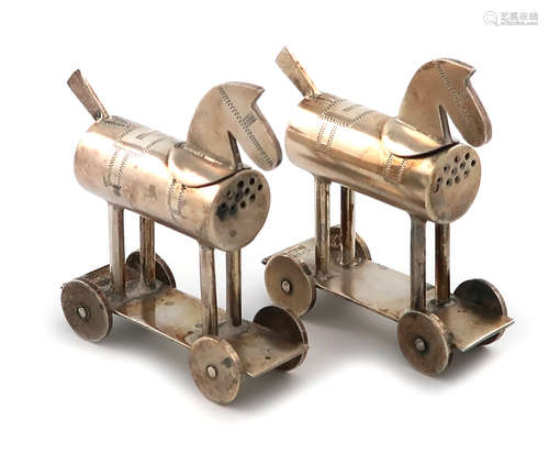 A pair of novelty silver pepper pots, by Saunders and Shepherd, Chester 1910, modelled as hobby