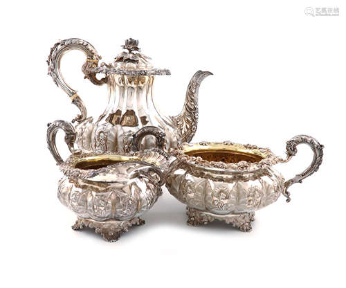 λA three-piece George IV silver coffee set, by Emes and Barnard, London 1828, lobed baluster form,