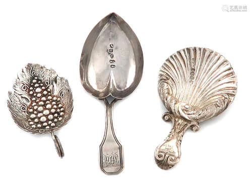 A small collection of three antique silver caddy spoons, comprising: one by Matthew Linwood,