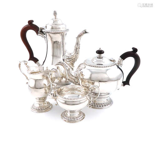 A matched modern four-piece silver tea and coffee set, by JCL, London 1968 and 1970, the coffee