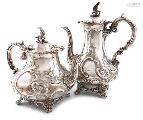 λA Victorian silver coffee pot and tea pot, by William Smily, London 1858, baluster form, embossed