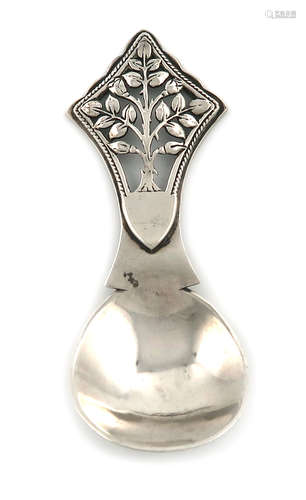 By H. G. Murphy, an Arts and Crafts silver caddy spoon, London 1933, oval bowl, the handle pierced