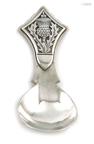 By H. G. Murphy, an Arts and Crafts silver caddy spoon, London 1935, fig-shaped bowl, spot-