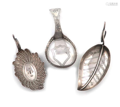 A small collection of three antique silver caddy spoons, comprising: one of leaf form, by Joseph