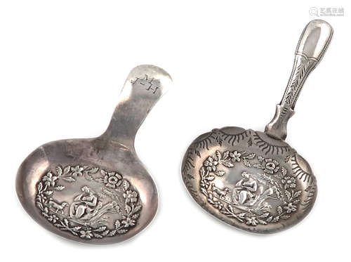 A George IV silver caddy spoon, by John Bettridge, Birmingham 1822, the oval bowl embossed with a