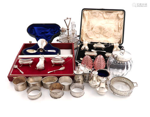 A mixed lot of silver condiments, various dates and makers, comprising: a Victorian four-bottle