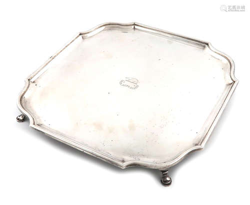 A silver salver, by D and J Wellby, London 1920, square form, canted corners, moulded border, the