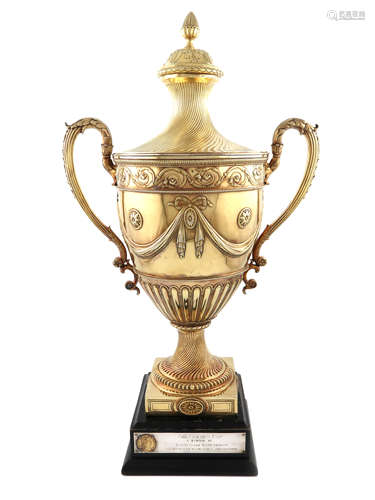 A two-handled silver-gilt cup and cover, with cancelled marks and London Assay Office marks for