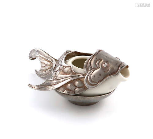 By Bryony Knox, a modern silver-mounted ceramic sauce jug, Edinburgh 2008, modelled as a fish,