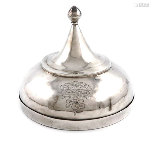 A 19th century Indian silver box, unmarked, circular form, raised cover with a pointed finial, the