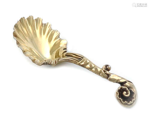 A William IV cast silver-gilt caddy spoon, by Paul Storr, London 1834, shell bowl, foliate scroll