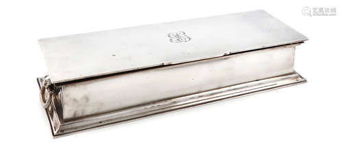 A silver inkstand, by Asprey and Co. Ltd., London 1910, in the Treasury inkstand manner, rectangular