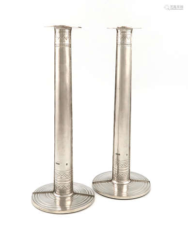 By Adrian K A Hope, a pair of modern silver candlesticks, Edinburgh 1995, tapering columns, matted