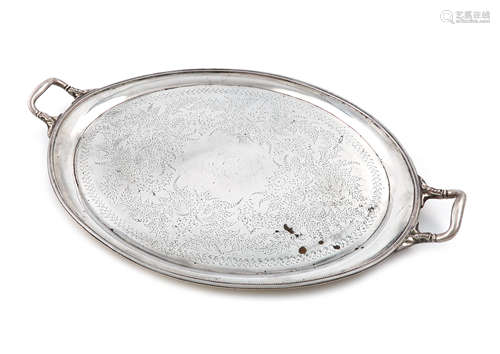 A Victorian two-handled parcel-gilt silver tray, by George Adams, London 1876, oval form, the centre