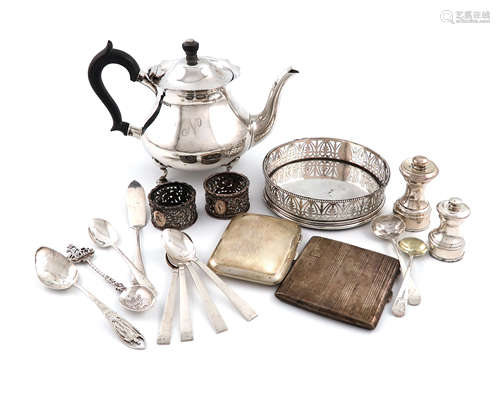 A mixed lot of silver items, various dates and makers, comprising: a George III wine coaster, by