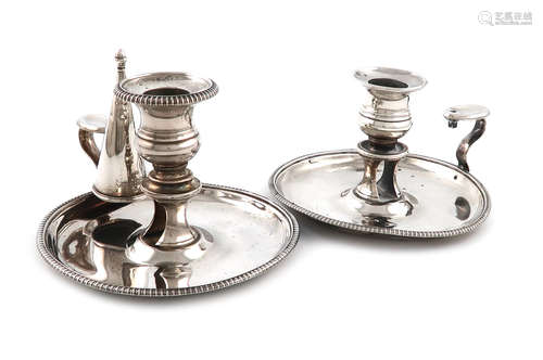 A matched pair of George III silver chamber sticks, by John Roberts & Co, Sheffield 1810 and 1813.