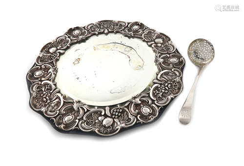 An Edwardian silver dressing table mirror, by Walker and Hall, Sheffield 1902, circular form,