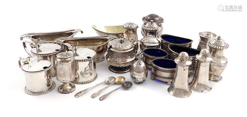 A mixed lot of silver condiments, various dates and makers, comprising: a George III muffineer,