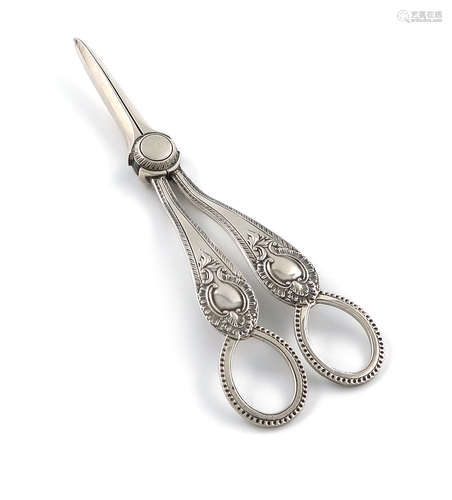 A pair of Victorian silver grape scissors, by Martin, Hall and Co, Sheffield 1888, with Feather-edge