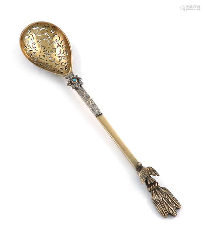 An unusual Victorian silver-gilt sifting spoon in the Turkish manner, by Francis Boone Thomas,