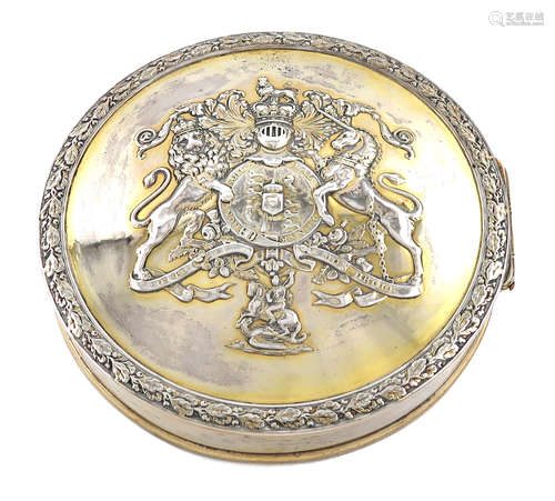 A George III silver-gilt seal box, by Philip Rundell, London 1819, circular form, the hinged cover