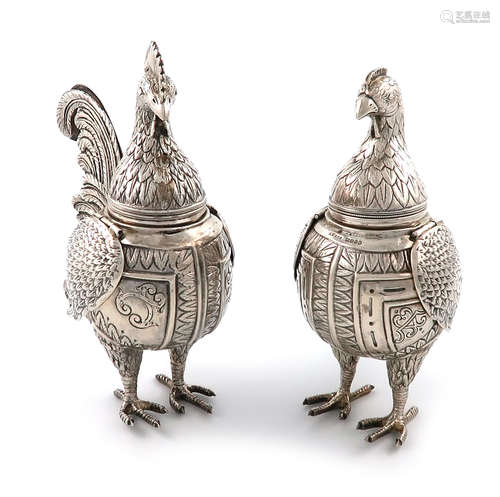 A matched pair of Edwardian German novelty sugar casters, one with import marks for London 1902,