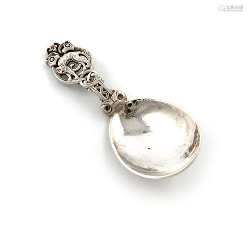 A Norwegian Arts and Crafts silver caddy spoon, by Thune, Oslo, spot-hammered fig-shaped bowl, the