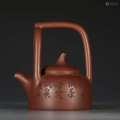 A Chinese Inscribed Handled Purple Sand Pot