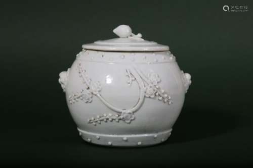 A CHINESE BLANC-DE-CHINE 'PRUNUS' JAR AND COVER.