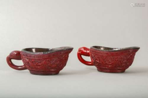 A PAIR OF CHINESE CINNABAR LACQUER POURING VESSELS, YI,