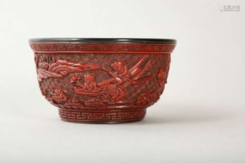 A CHINESE CARVED CINNABAR LACQUER 'BOYS' BOWL.