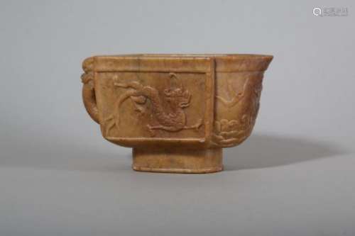 A CHINESE SOAPSTONE ARCHAISTIC 'DRAGON' POURING VESSEL.