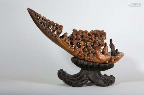 λ A LARGE AND IMPRESSIVE CHINESE RHINOCEROS HORN 'IMMORTALS' RAFT' CARVING.