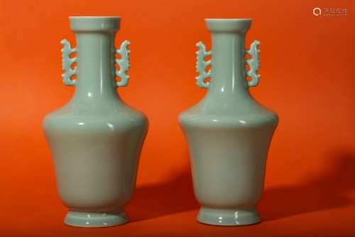A PAIR OF CHINESE CELADON-GLAZED VASES.