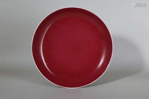 A CHINESE COPPER RED GLAZED DISH.