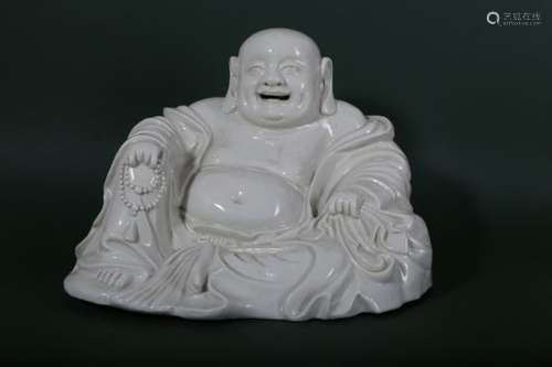 A CHINESE BLANC-DE-CHINE FIGURE OF BUDAI HESHANG.