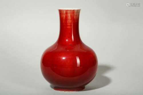 A CHINESE COPPER RED-GLAZED VASE.